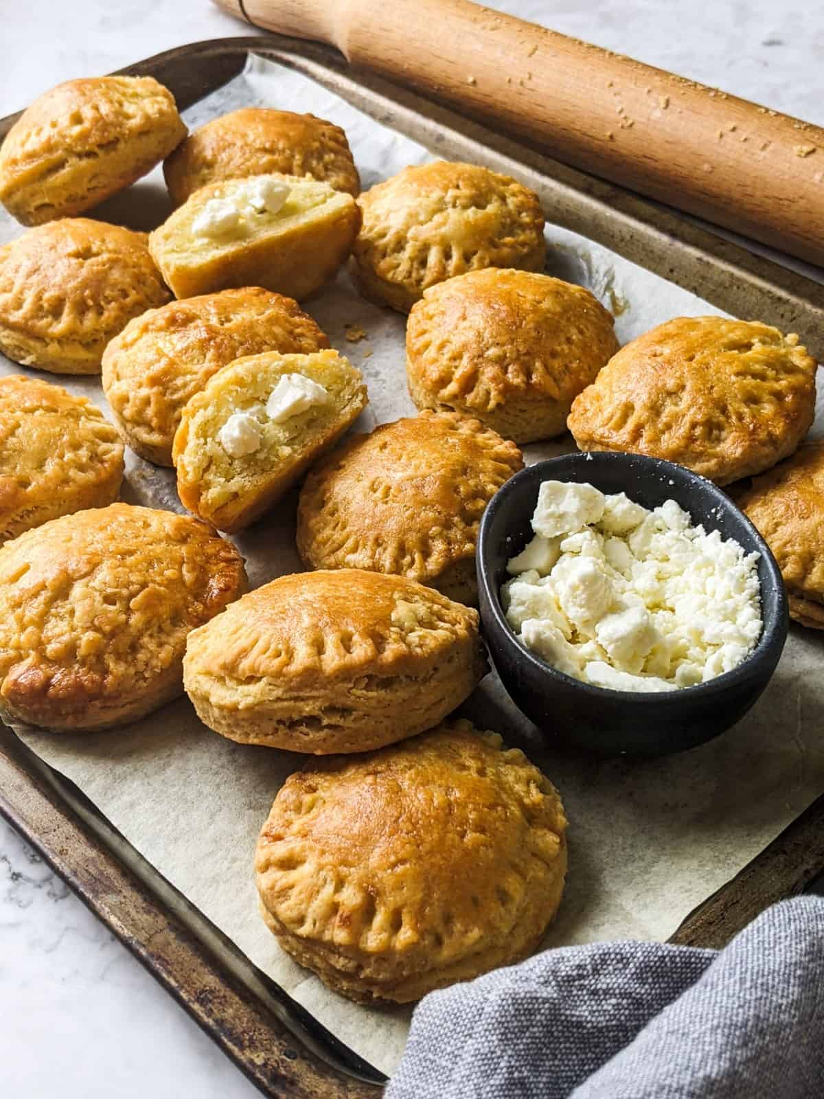 Mini cheese pies on a tray.