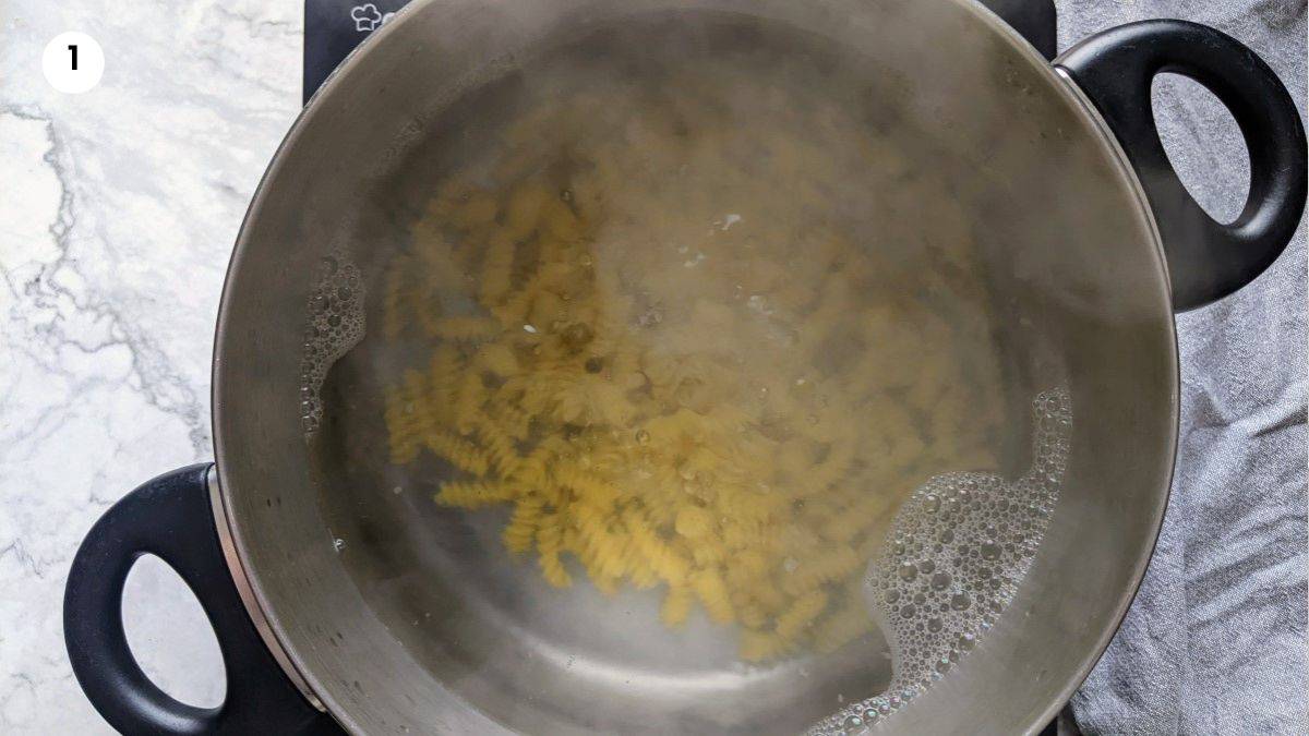 Step1: Boiling the pasta in big pot filled with water.