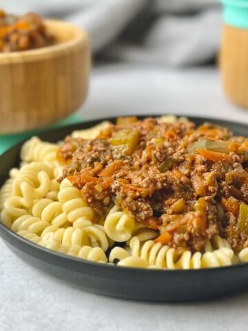 Veggie loaded bolognese served with rotini pasta.