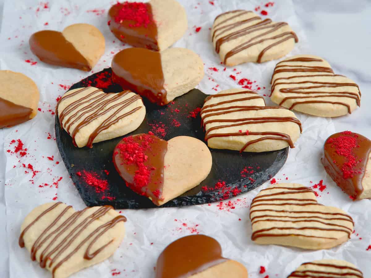Heart-shaped cookies with chocolate and vanilla flavors, perfect for kids' healthy snacks.