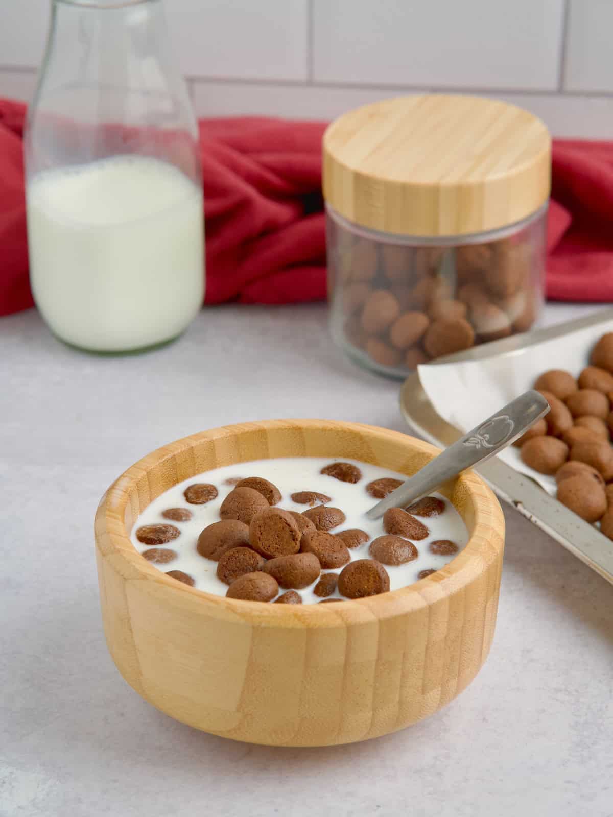 Cocoa puffs served in a bowl with milk.