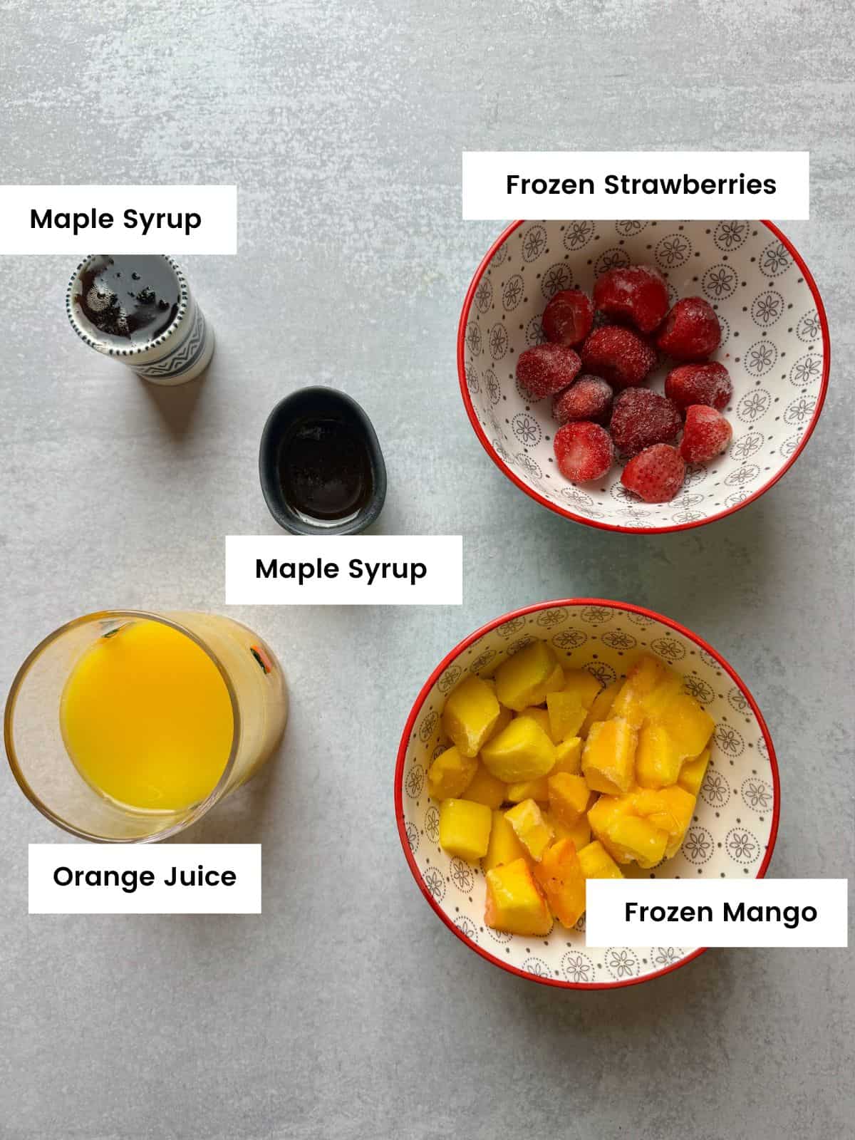 Ingredients for orange mango sunrise popsicles.