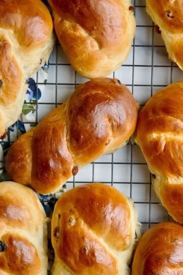 Brioche braids on a wire rack.