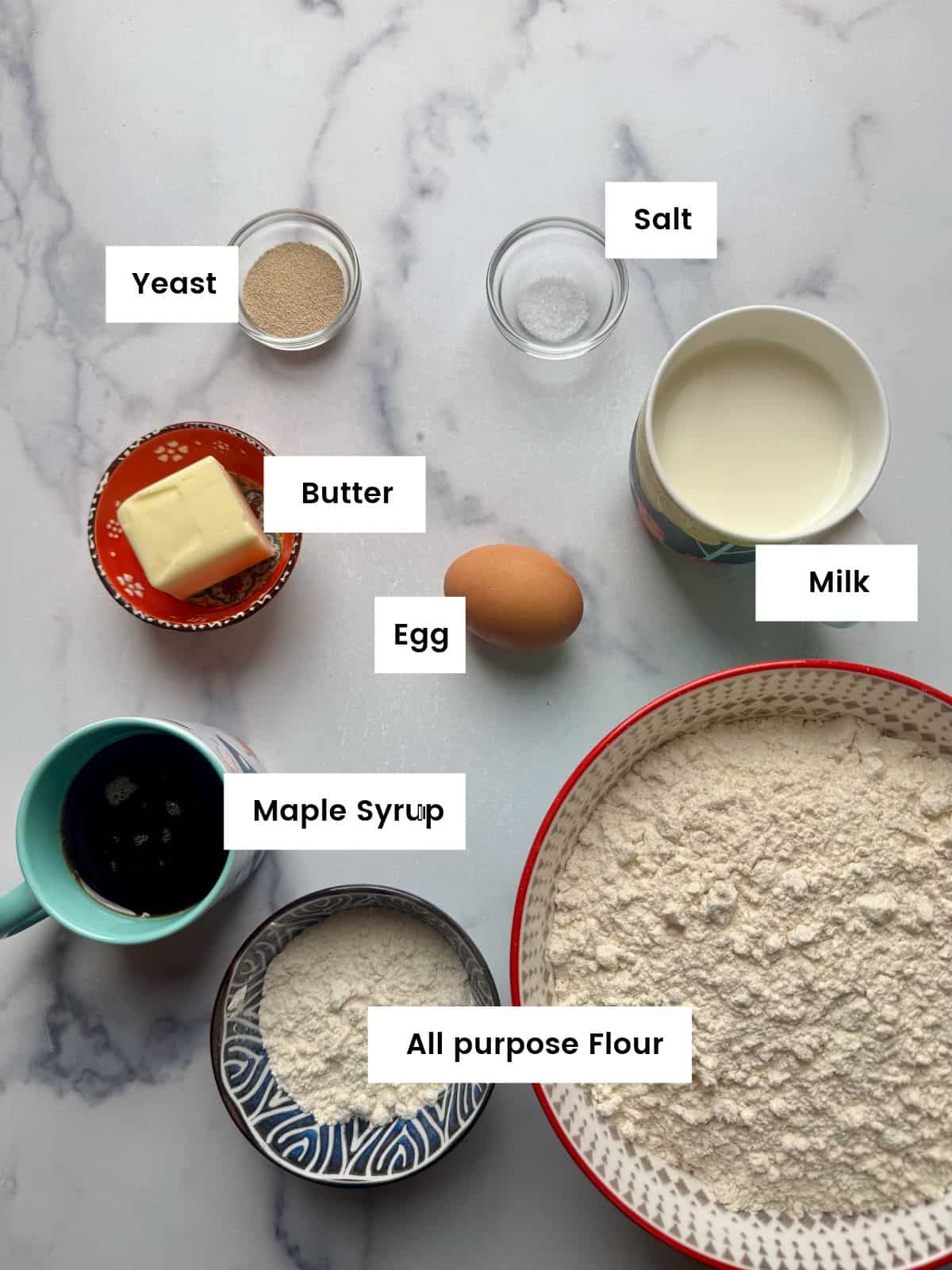 Ingredients for brioche braids with raisins.