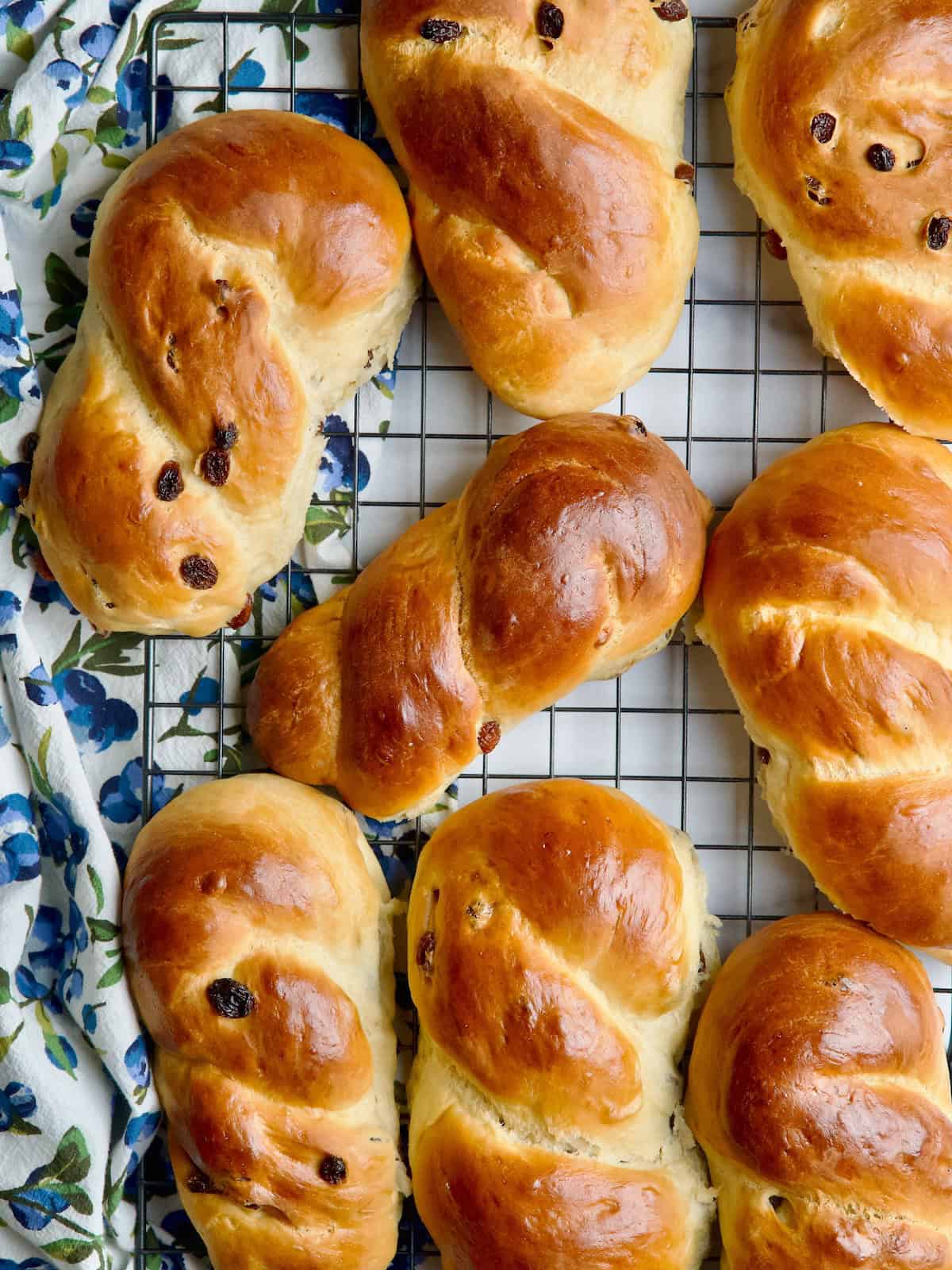 Brioche braids on a wire rack.